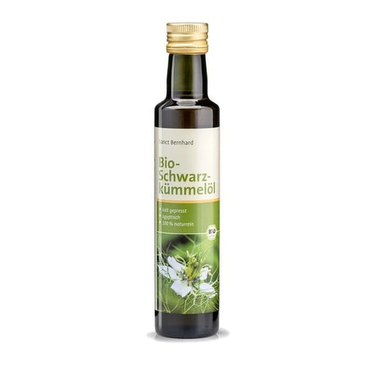 Bio-Kümmelöl von Kräuterhaus Sanct Bernhard in einer 250 ml Flasche, zeigt die klare Flüssigkeit und das Etikett.