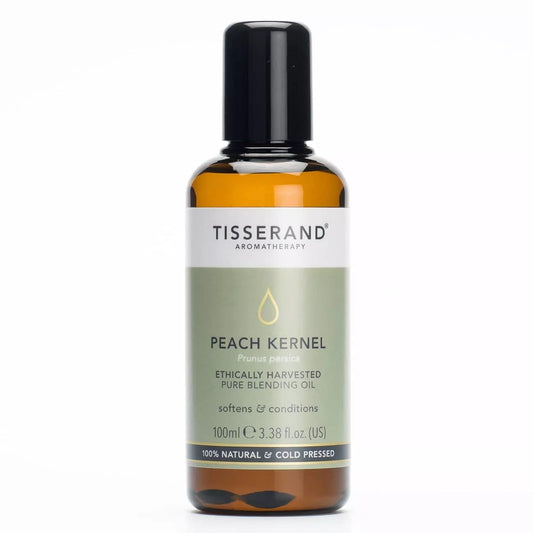 Ethisch geernteter Pfirsichkern Basisöl von Tisserand Aromatherapy, 100 ml, als Massageöl sichtbar in der Flasche.
