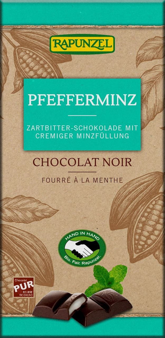 Dunkle Bio-Schokolade mit Minzfüllung von RAPUNZEL, 100 g, zeigt die zart schmelzende Schokolade mit Minzcremefüllung.