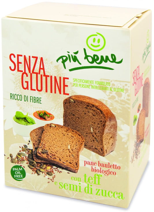 Bio glutenfreies Brot mit Teffmehl und Kürbiskernen, frisch gebacken, auf einem rustikalen Holzbrett.