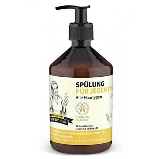 Conditioner für alle Haartypen von OMA GERTRUDE in 500 ml Flasche, cremige Textur, zeigt glänzendes, gepflegtes Haar