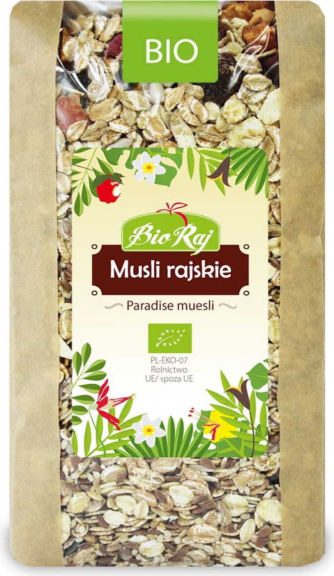 Bio-Raj Rajskie Müsli 700 g in einer Schüssel mit frischem Obst und Nüssen, naturbelassen und ballaststoffreich.