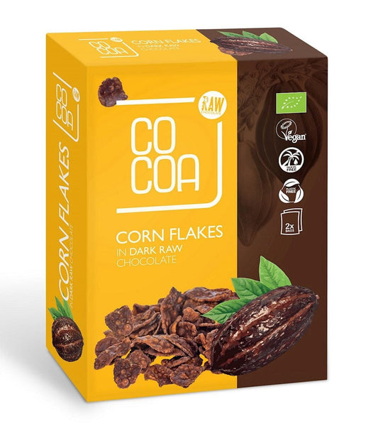 Bio Cornflakes mit Zartbitterschokolade von COCOA, 200 g Packung, Nahaufnahme der knusprigen Cornflakes mit dunkler Schokolade