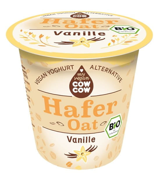 Bio Vanille-Haferprodukt von COW COW, 150 g, zeigt eine Schale mit cremigem Hafer mit Vanillegeschmack und frischen Zutaten