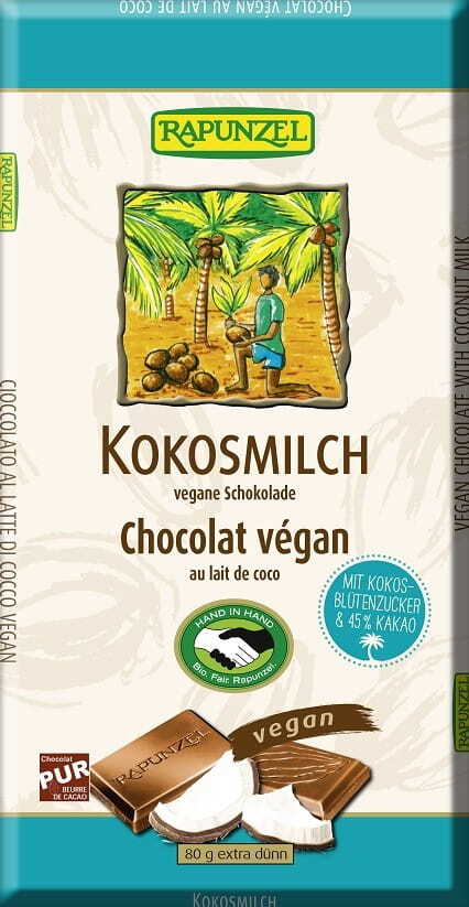 Bio Fair gehandelte Kokos-Schokolade von RAPUNZEL, 80 g, mit Kokosnussstücken und schokoladiger Textur, in einer Verpackung.