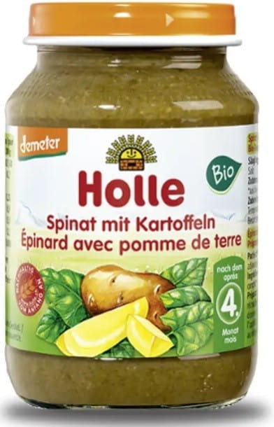 Babyspinat mit Kartoffeln BIO von HOLLE in einer Schale, frischer grüner Spinat und Kartoffelstücke auf weißem Hintergrund
