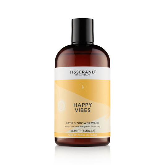 Duschgel von TISSERAND, Happy Vibes Bath & Shower in 400 ml Flasche, mit frischem, blumigem Duft, zeigt die Verpackung.
