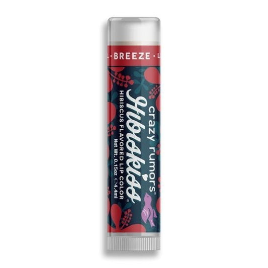 Färbender Lippenbalsam von CRAZY RUMORS in buntem Design, zeigt den Lippenbalsam in der Verpackung auf dem Bild.