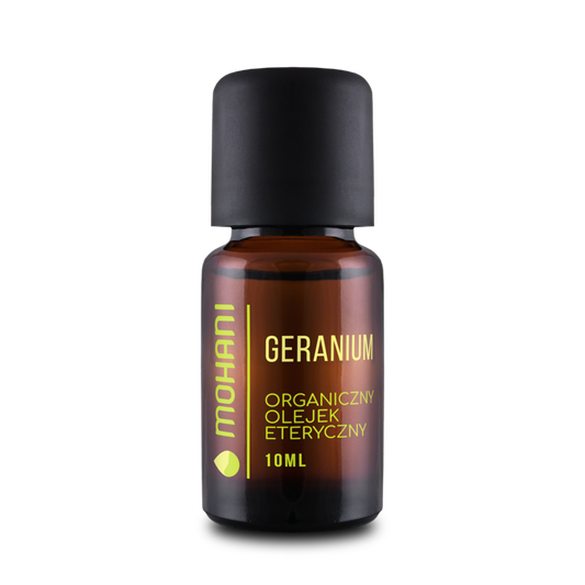 Ätherisches Geranienöl von MOHANI, biologisch angebaut, in einer Glasflasche mit Blüten und Blättern zur Darstellung des Produkts